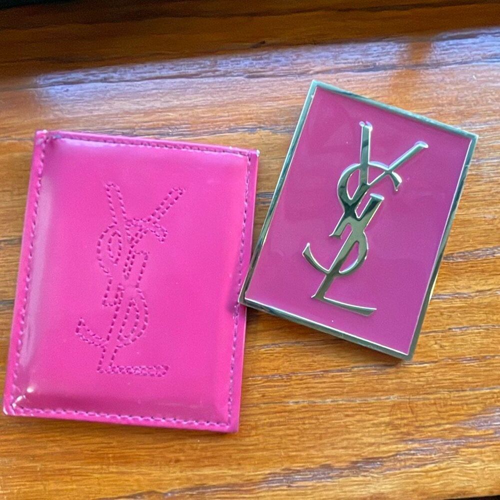 Yves Saint Laurent Beaute Fuchia and gold handbag mirror set.
